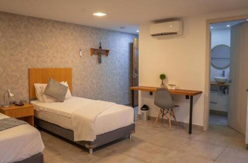 Foto de una habitación de Hotel Bambu Milla De Oro