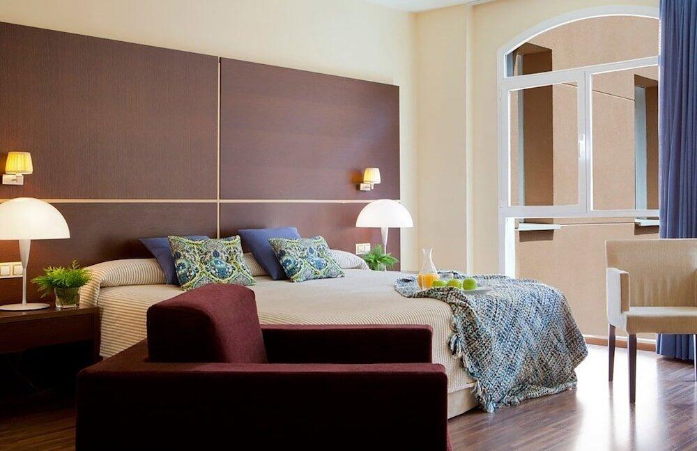 Foto de una habitación de Hotel Rice Palacio de los Blasones