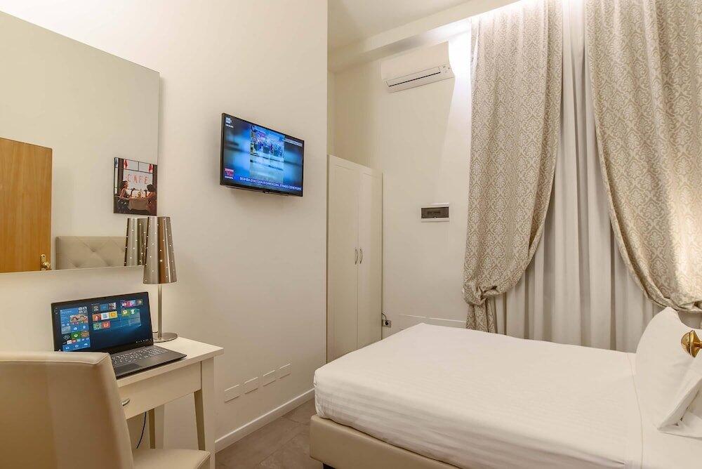 Foto de una habitación de Hotel Accademia
