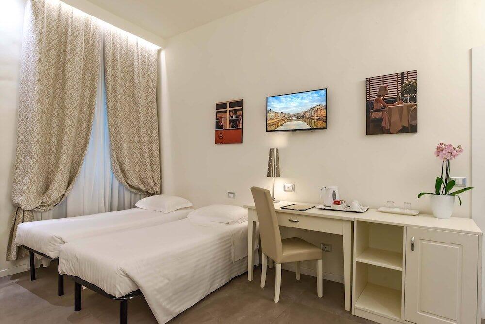 Foto de una habitación de Hotel Accademia