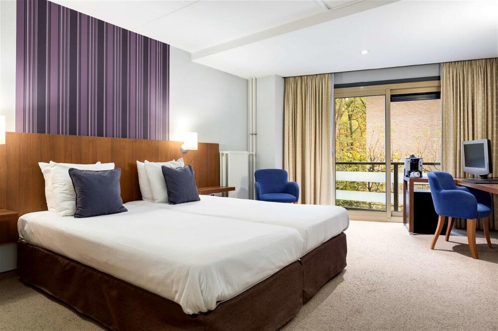 Foto de una habitación de Hotel NH Veluwe Sparrenhorst