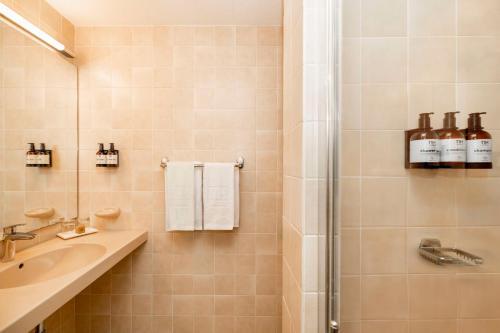 Foto del baño de Hotel NH Veluwe Sparrenhorst