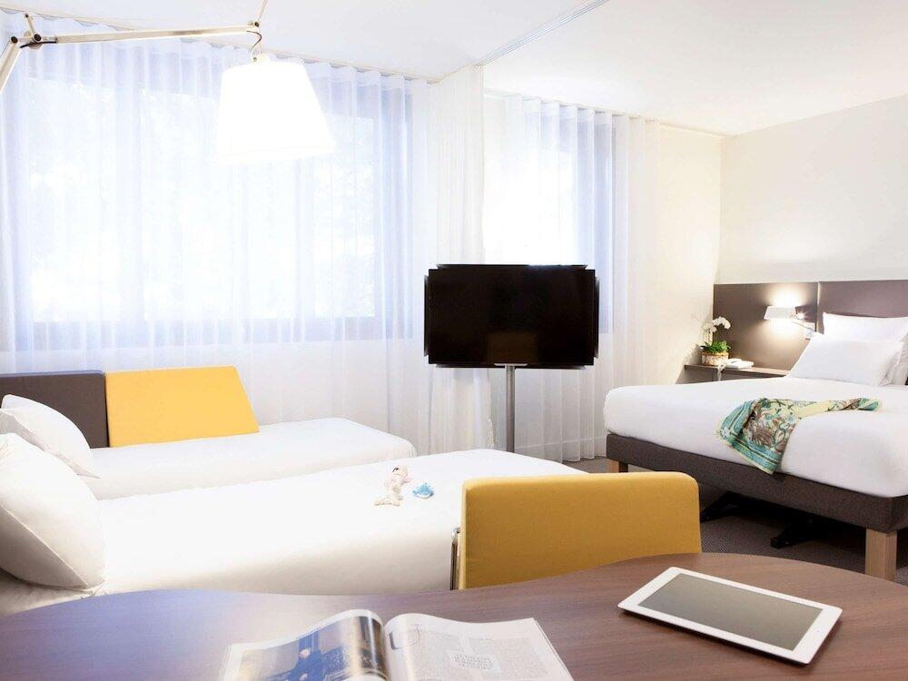 Foto de una habitación de Hotel Novotel Suites Paris Stade De France