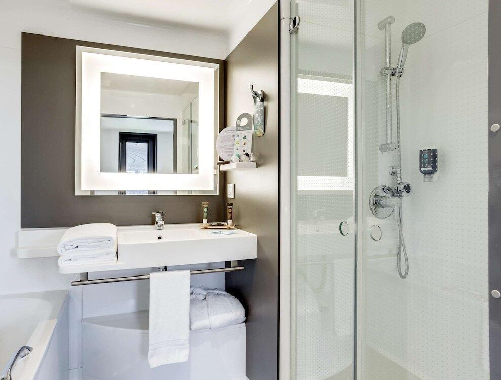 Foto del baño de Hotel Novotel Suites Paris Stade De France