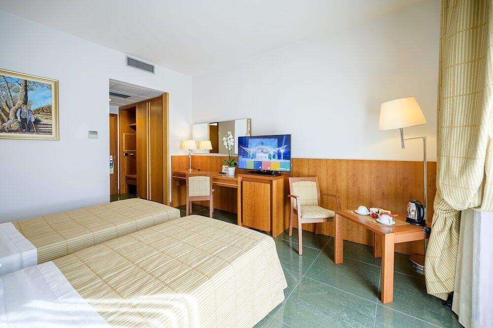 Foto de una habitación de Hotel dei Principati