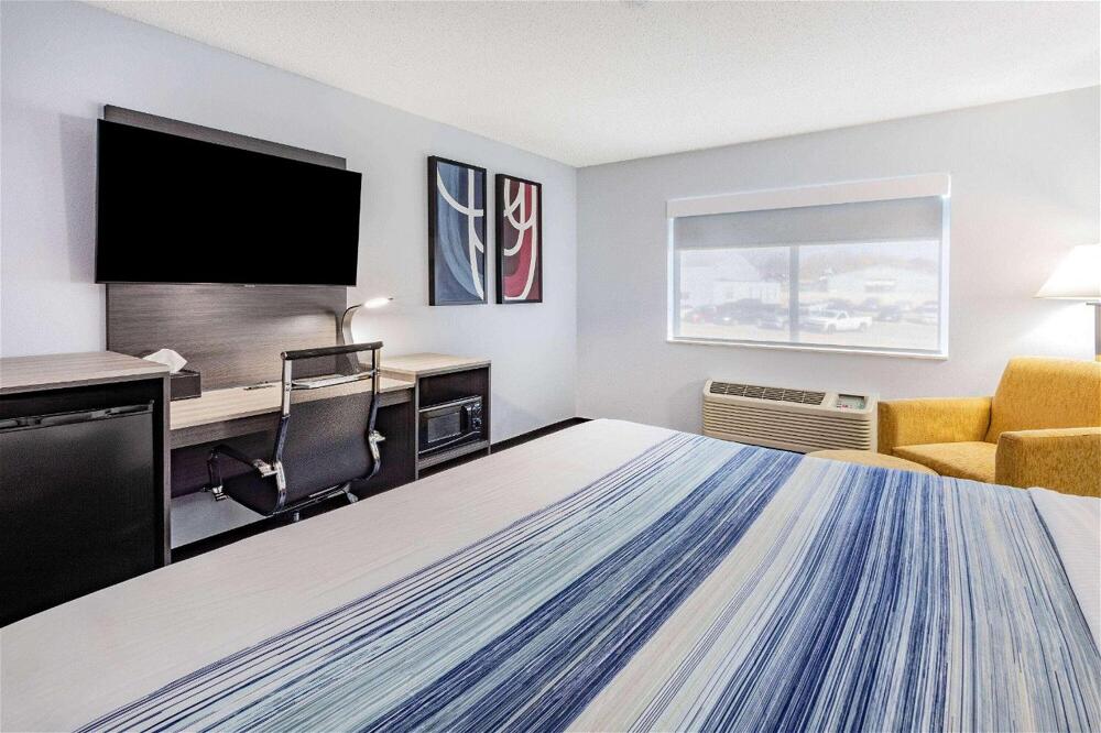 Foto de una habitación de Hotel AmericInn by Wyndham Quincy