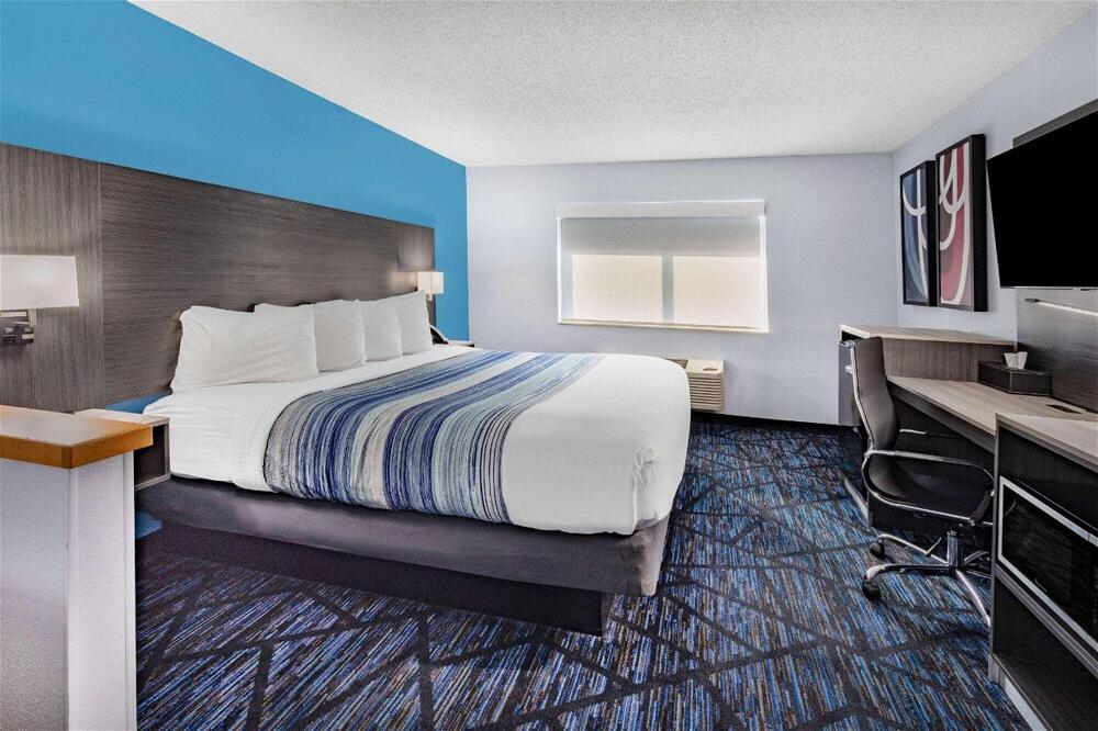 Foto de una habitación de Hotel AmericInn by Wyndham Quincy