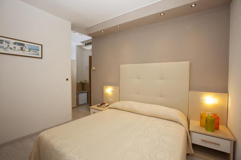 Foto de una habitación de Hotel Torino