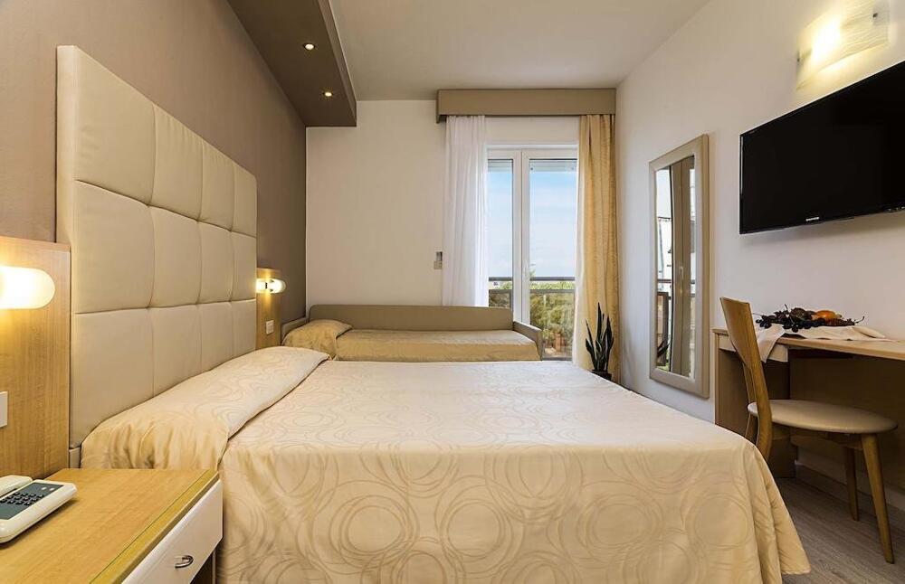 Foto de una habitación de Hotel Torino