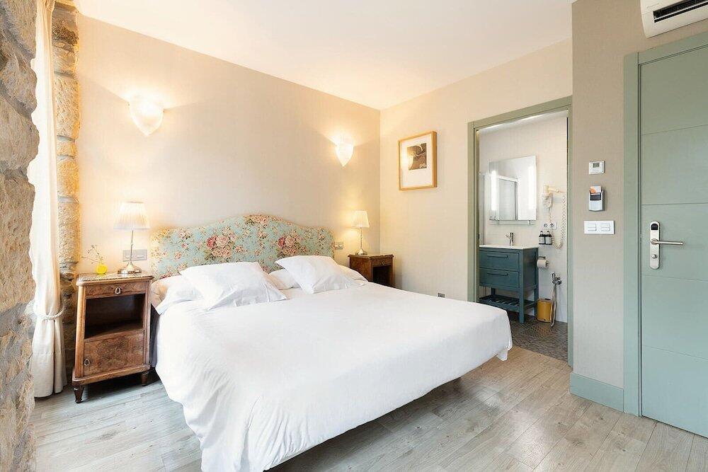 Foto de una habitación de Okako Hotel