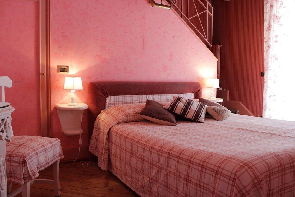 Foto de una habitación de Hotel Colonne