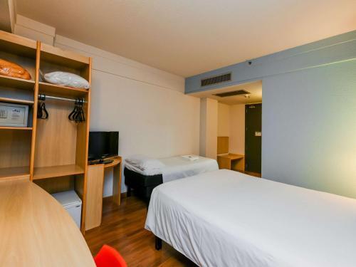 Foto de una habitación de Hotel ibis Guarulhos Aeroporto