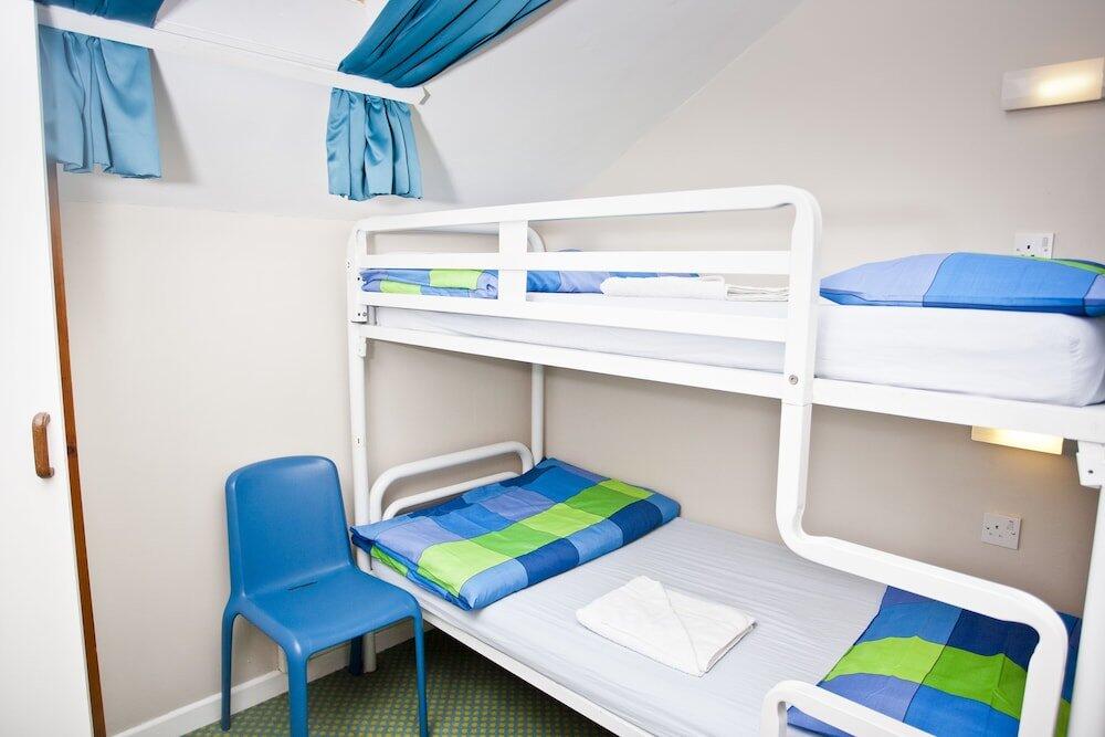 Foto de una habitación de Snoozles Quay Street Tourist Hostel