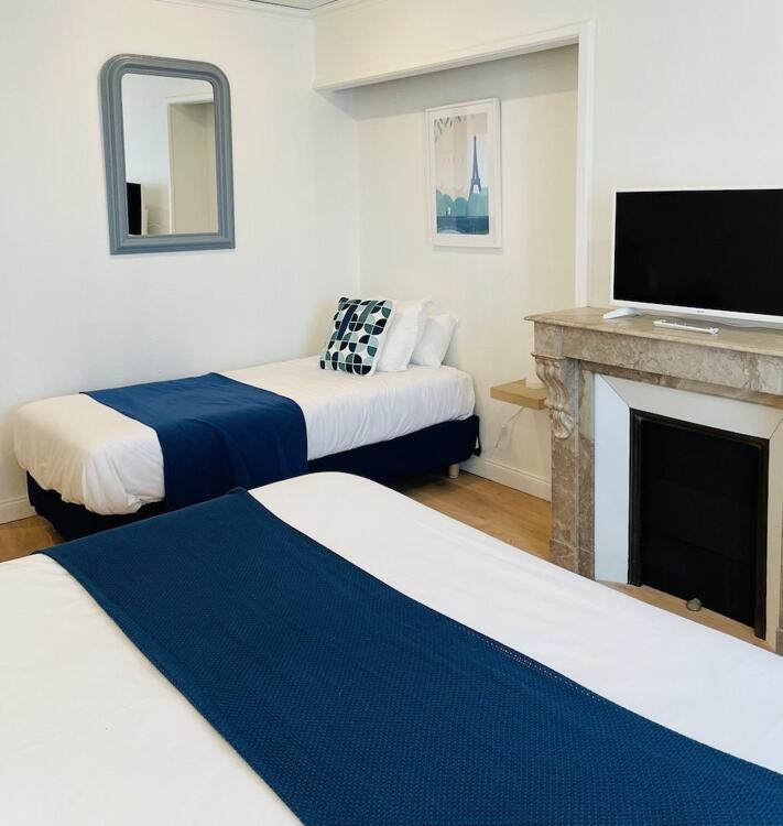 Foto de una habitación de Hôtel Porte Mars Reims Gare Centre