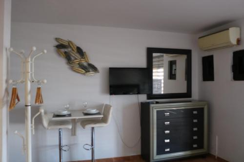 Foto de una habitación de Apartamentos La Carmen