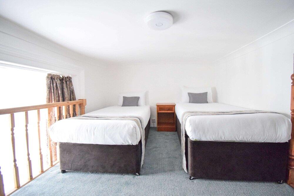 Foto de una habitación de Pembridge Palace Hotel