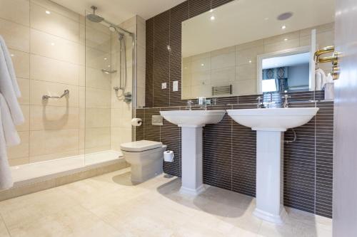 Foto del baño de Swan&amp;#039;s Nest Hotel