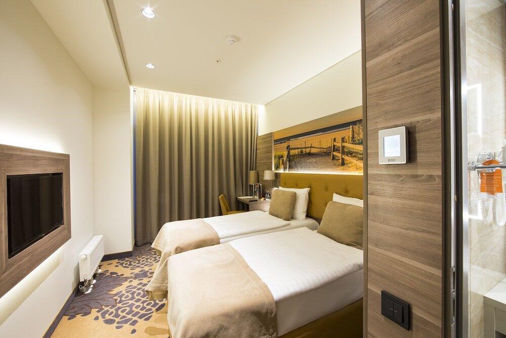 Foto de una habitación de Lielupe Hotel SPA &amp;amp; Conferences by Semarah