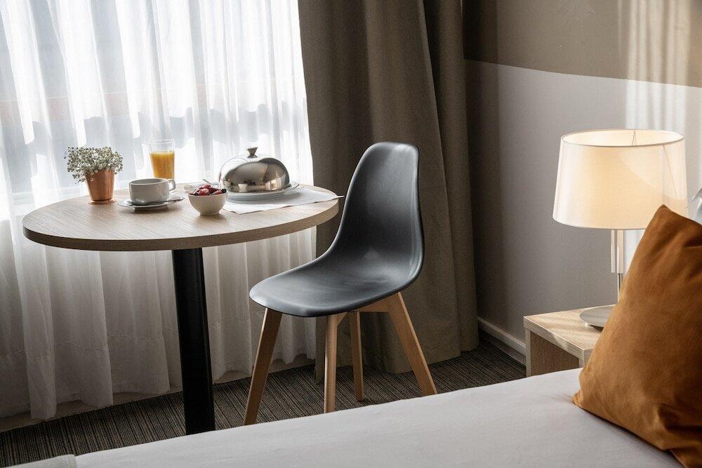 Foto de una habitación de Hotel Amarante Cannes