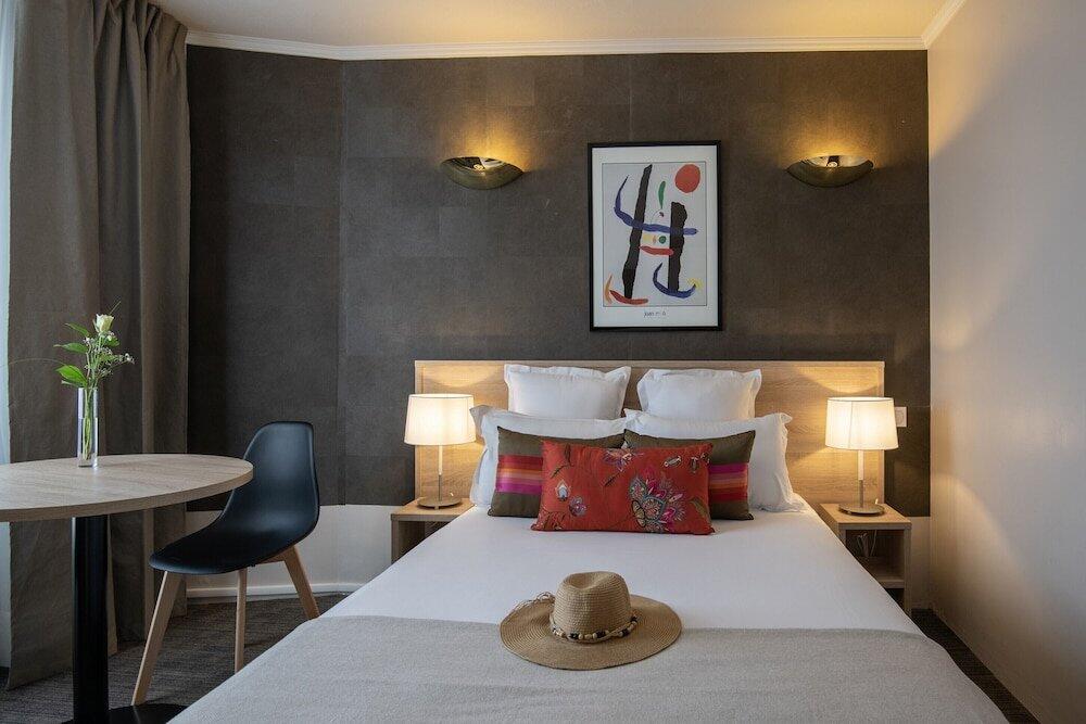 Foto de una habitación de Hotel Amarante Cannes