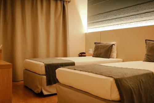 Foto de una habitación de Hotel Carlton Plaza Baobá