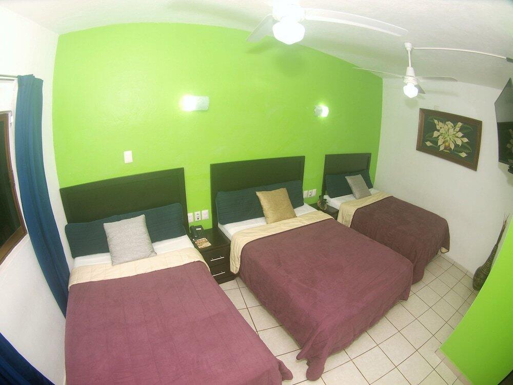 Foto de una habitación de Hotel Hospedajes Del Rey