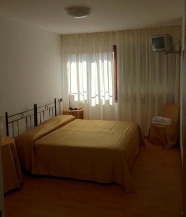 Foto de una habitación de Hostal Guesthouse Alloggi Agli Artisti