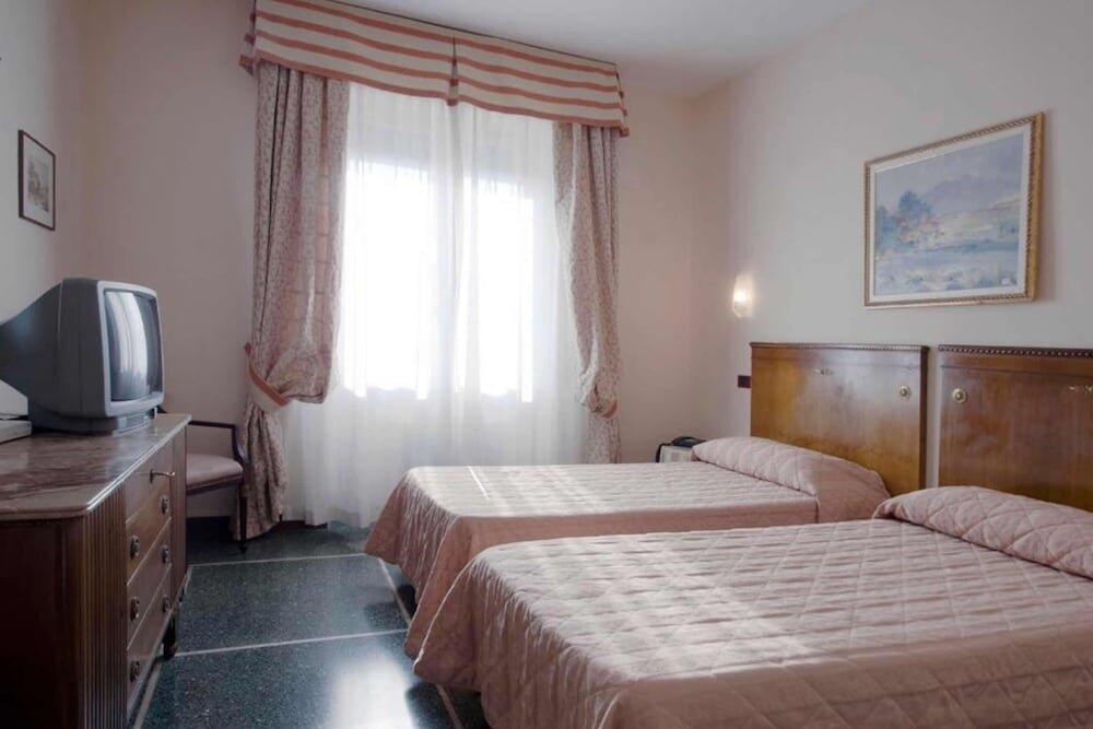Foto de una habitación de Hotel La Pace