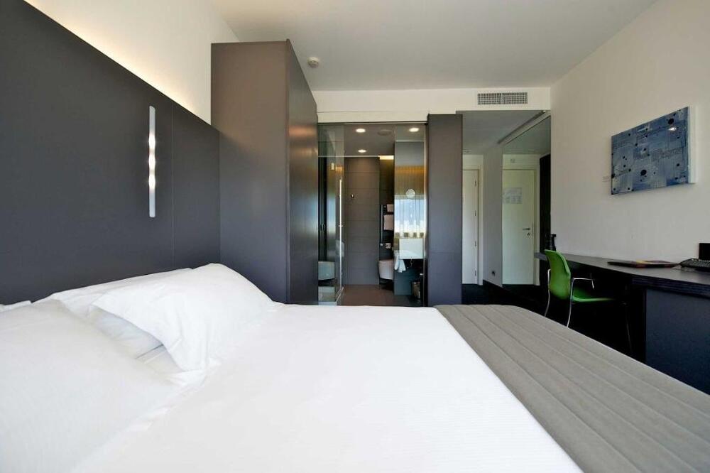 Foto de una habitación de Hotel Mercure Nerocubo Rovereto
