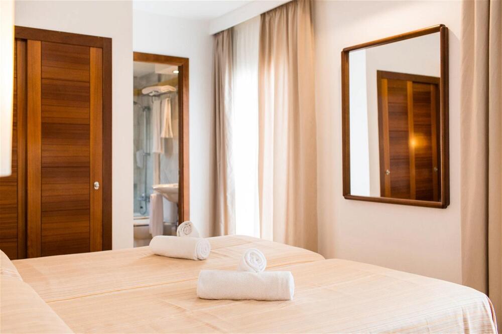 Foto de una habitación de Sagitario Hostal Ciutadella
