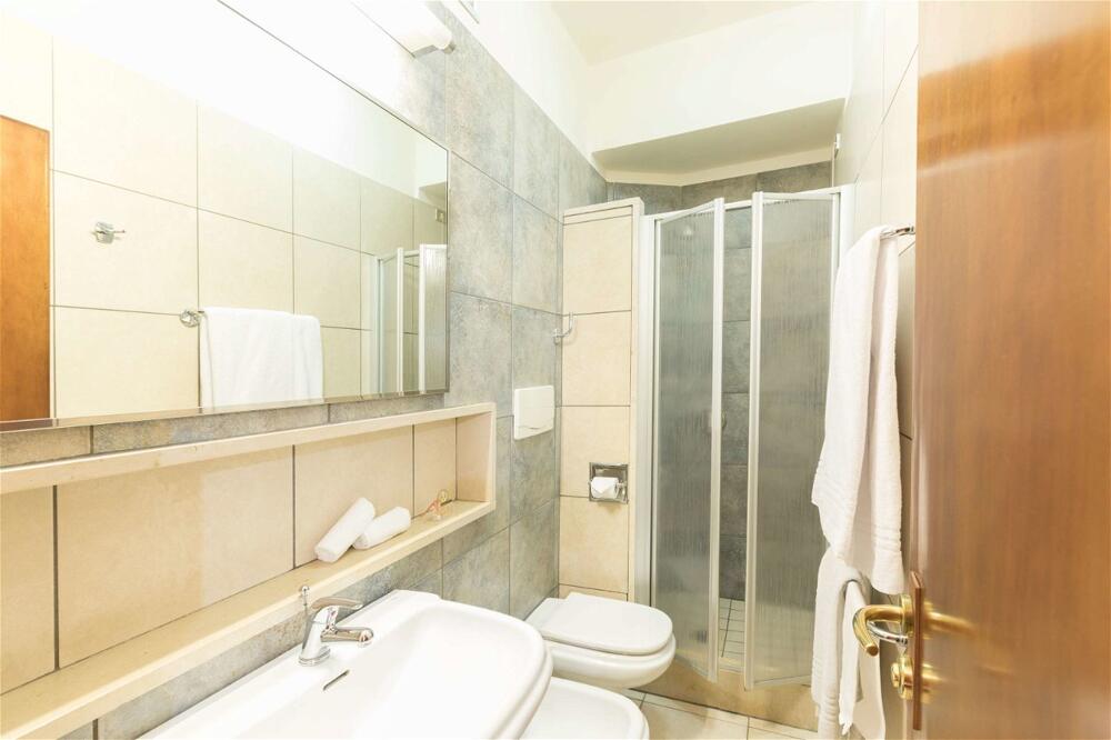 Foto del baño de Hotel La Baia