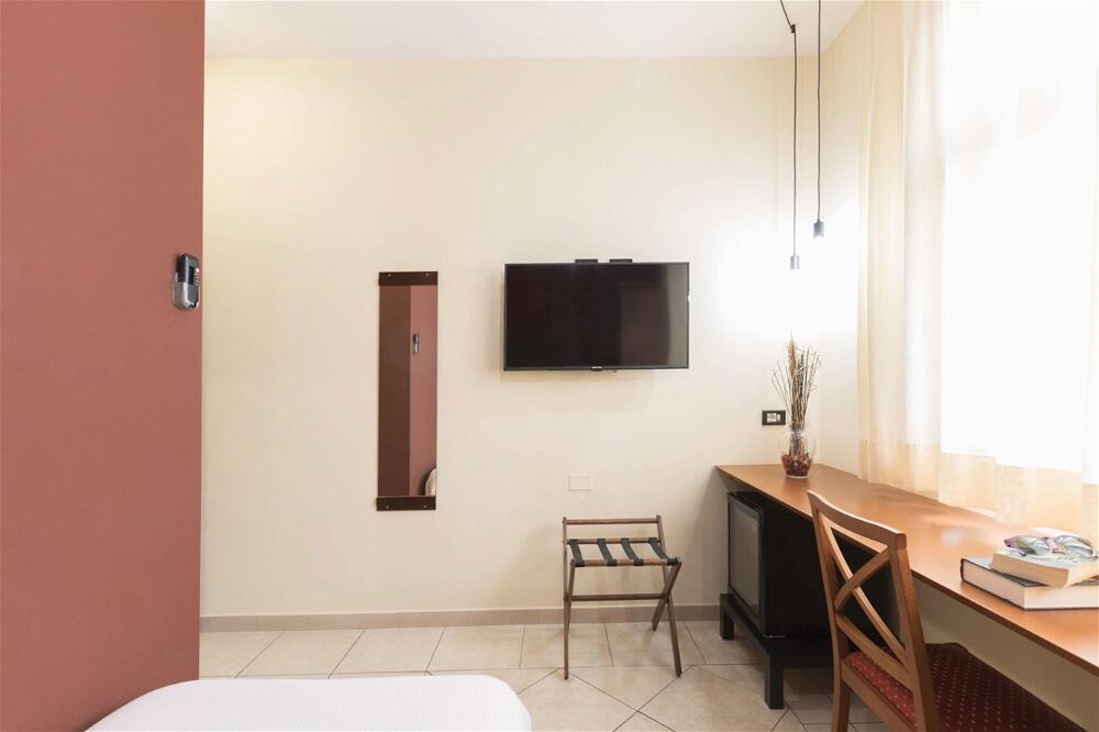 Foto de una habitación de Hotel La Baia