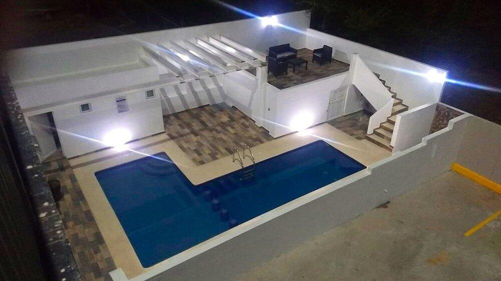 Foto de una habitación de Aparthotel Marina Suites