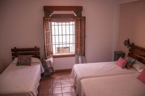 Foto de una habitación de Hospederia Casa de las Piedras