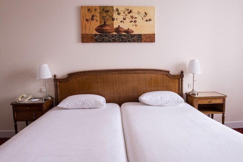 Foto de una habitación de Hotel Eden Palace au Lac