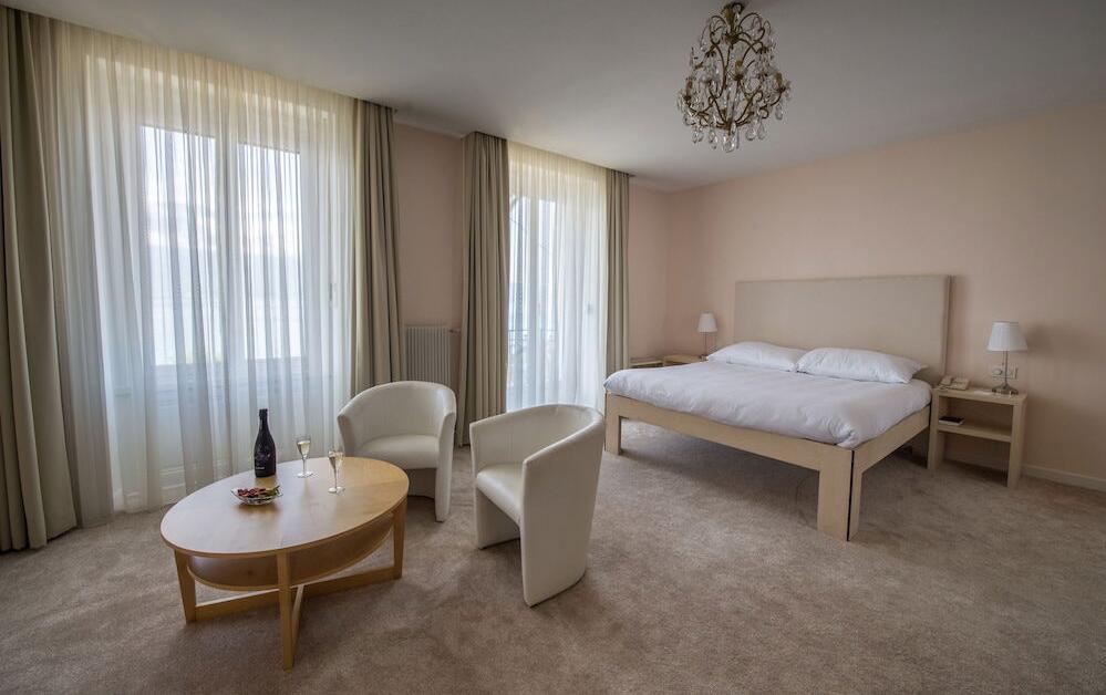Foto de una habitación de Hotel Eden Palace au Lac