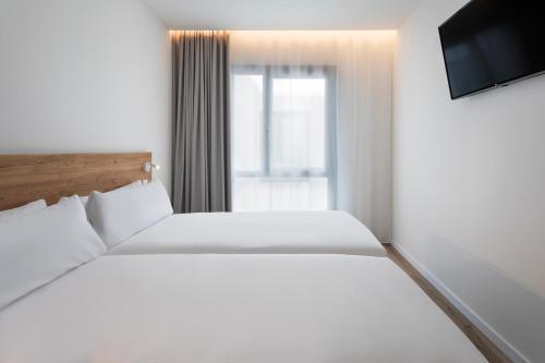 Foto de una habitación de B&amp;amp;B HOTEL Écija