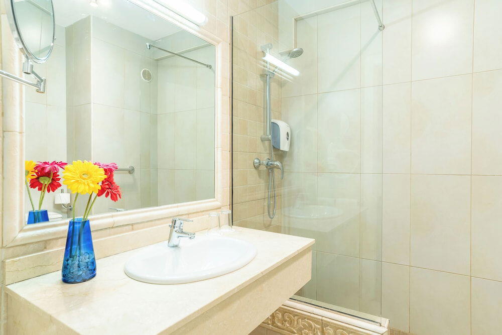 Foto del baño de Hotel HOVIMA Jardin Caleta