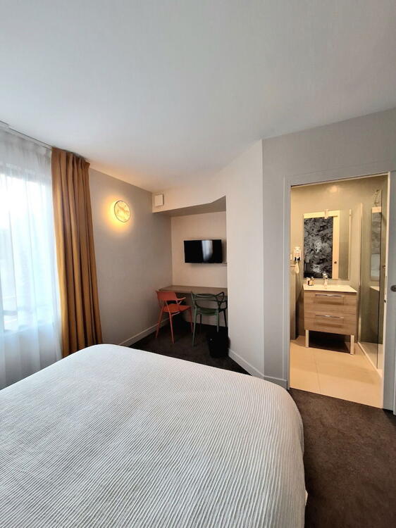 Foto de una habitación de Hotel Les Herbes Folles