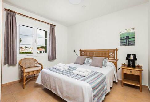 Foto de una habitación de Villas Cala Galdana