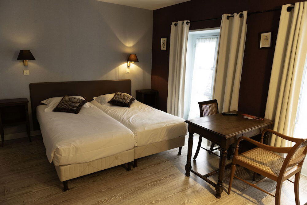 Foto de una habitación de Hotel du Saumon