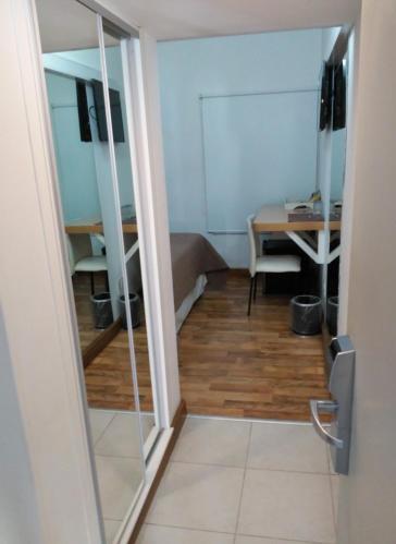 Foto de una habitación de Global Hotel