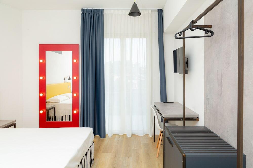 Foto de una habitación de Wave Hotel