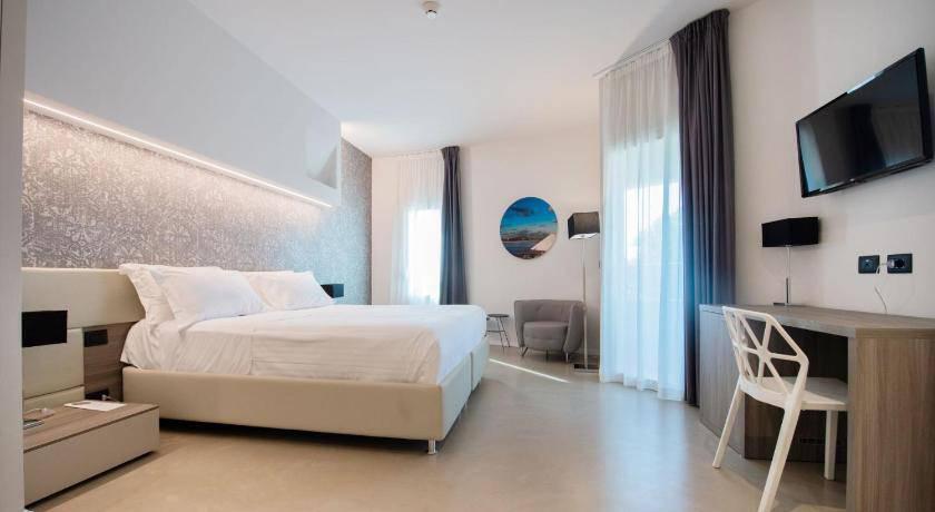 Foto de una habitación de Grand Hotel Faraglioni