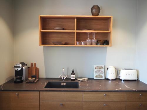 Foto de una habitación de Hypernym Hotel &amp;amp; Suites