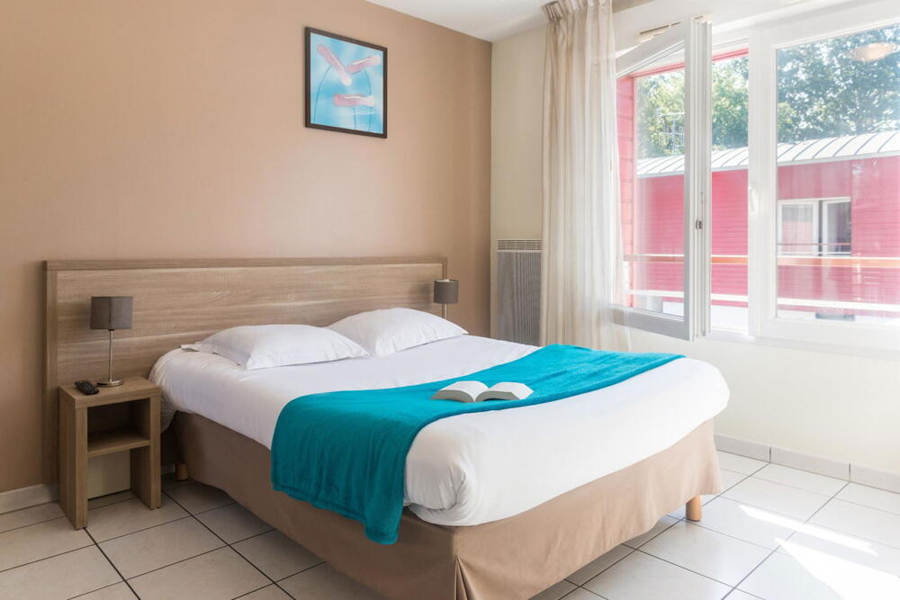 Foto de una habitación de Zenitude Hôtel-Résidences Nantes - La Beaujoire