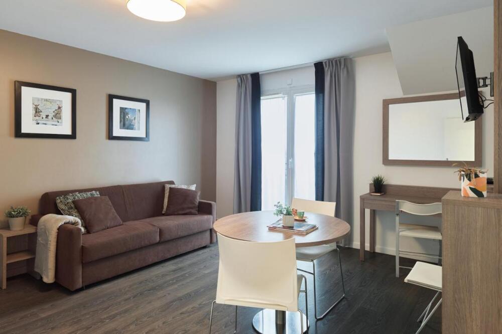 Foto de una habitación de Zenitude Hôtel Résidences Roissy Village