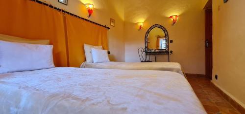 Foto de una habitación de Hostal Kasbah Ait ben Damiette