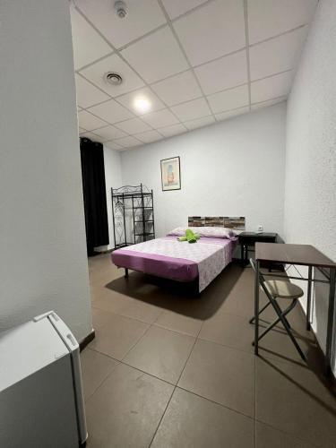 Foto de una habitación de Hostal Milan