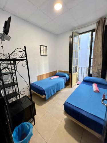 Foto de una habitación de Hostal Milan